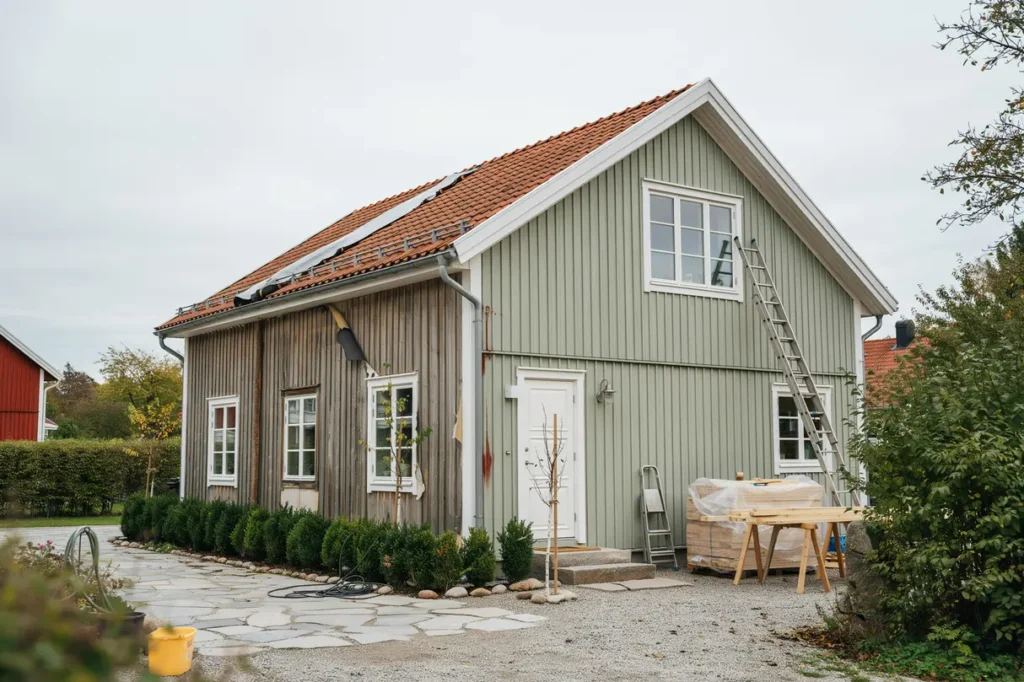 byta panel och m la tr fasad tecken kostnad och smarta val f r ett h llbart hus